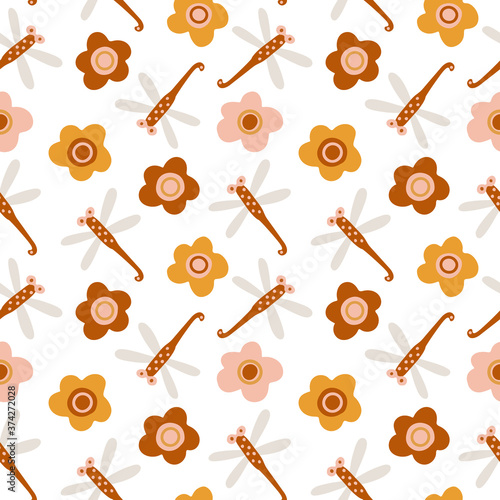 Vector seamless pattern with boho colors dragonflies and flowers on white. Perfect decoration for kids playroom and bedroom, wallpapers, fabrics. Muted trendy colors. Wrapping papers, covers, textile.