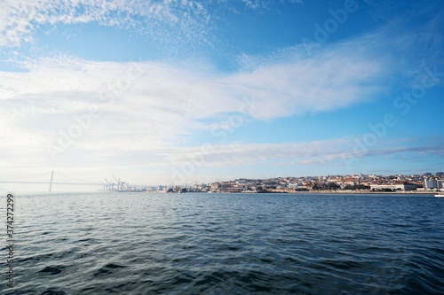 Tagus river in Lisbon. View on Bridge and city shore.