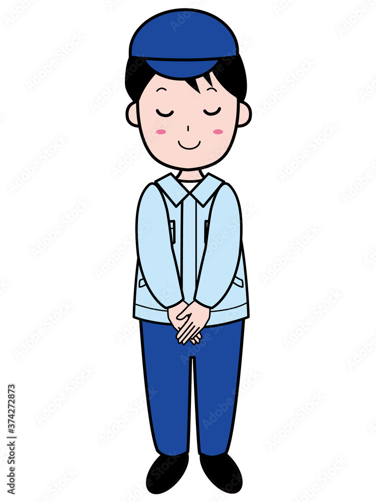 おじぎをする作業服姿の若い男性 おじぎをする作業服姿の若い男性