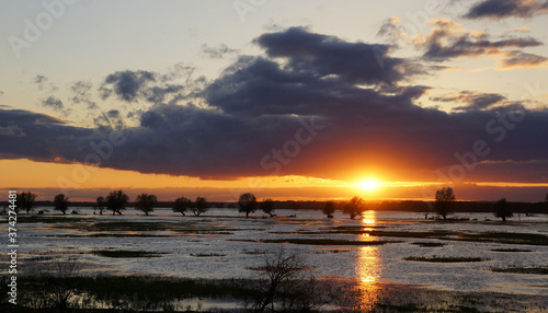April over the Warta floodplains, sunset after a stormy day