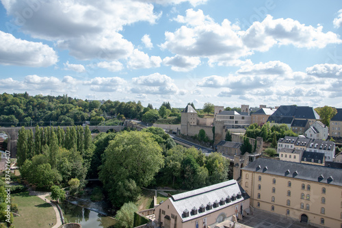 Aerial shot of the buildings under a cloudy bright sky in Luxembourg photo