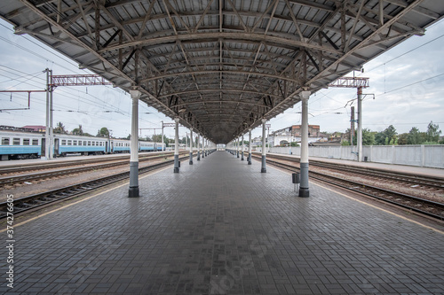 Empty railway platform in the style of the 19th century. Konotop railway station, Ukraine.