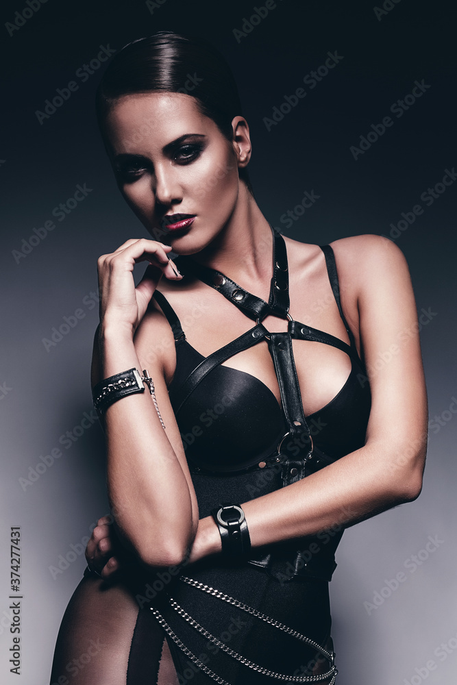 sexy woman in leather bandage