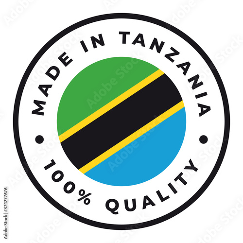 Vector circle symbol. Text Made in Tanzania with flag. Isolated on white background.