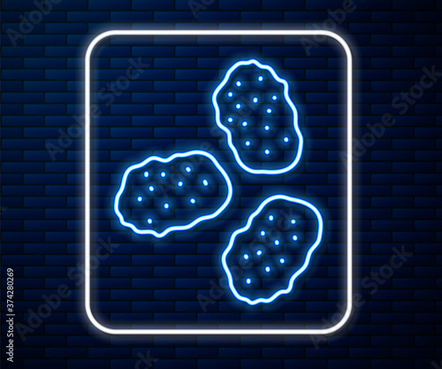 Glowing neon line Chicken nuggets icon isolated on brick wall background. Vector Illustration.
