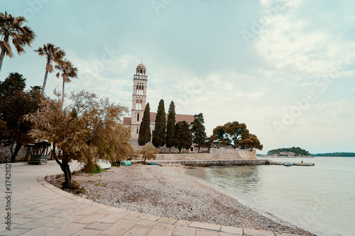 Franciscan Monastery on old town sea shore, Hvar, Croatia.