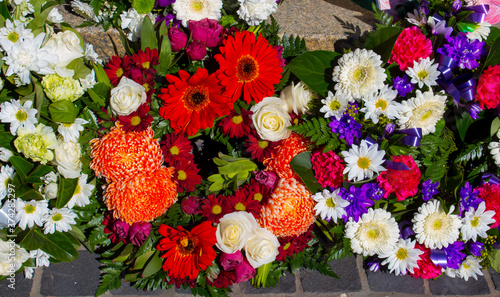 Fototapeta Naklejka Na Ścianę i Meble -  Beautiful colorful fresh floral  wreaths  for Anzac Day memorial celebrations  25th April in Bunbury ,Western Australia to honor and remember those who gave their lives in battles 