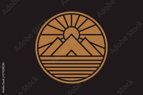 Egyptian mystical pyramids with sun and rays