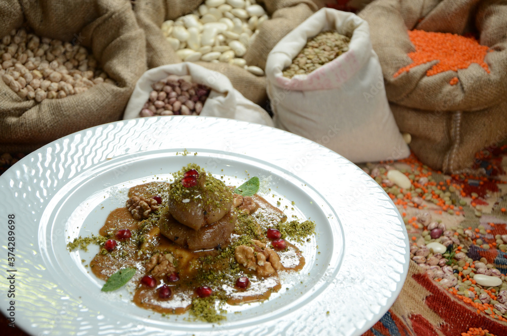 turkish traditional dessert in front of legume family sacks turkish traditional dessert in front of legume family sacks