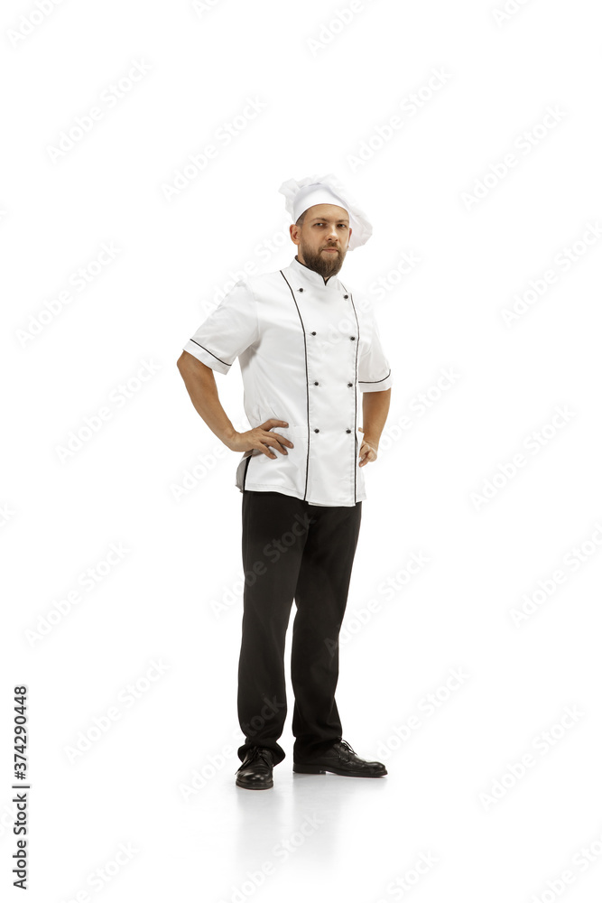 Cooker, chef, baker in uniform isolated on white studio background, gourmet. Young man, restaurant cooker's portrait. Business, foor, professional occupation, emotions concept. Copyspace for ad. Cooker, chef, baker in uniform isolated on white studio background, gourmet. Young man, restaurant cooker's portrait. Business, foor, professional occupation, emotions concept. Copyspace for ad.