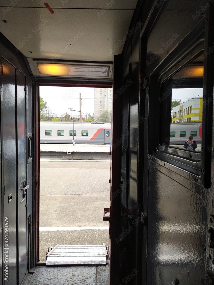 View of the platform from the passenger train vestibule View of the platform from the passenger train vestibule
