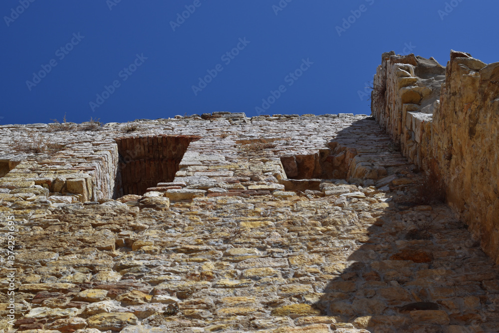 contrast of colors of ancient ruins located in Tuscany