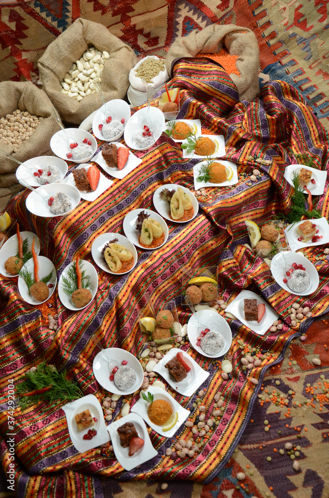 traditional turkish ottoman food in front of legume family sacks