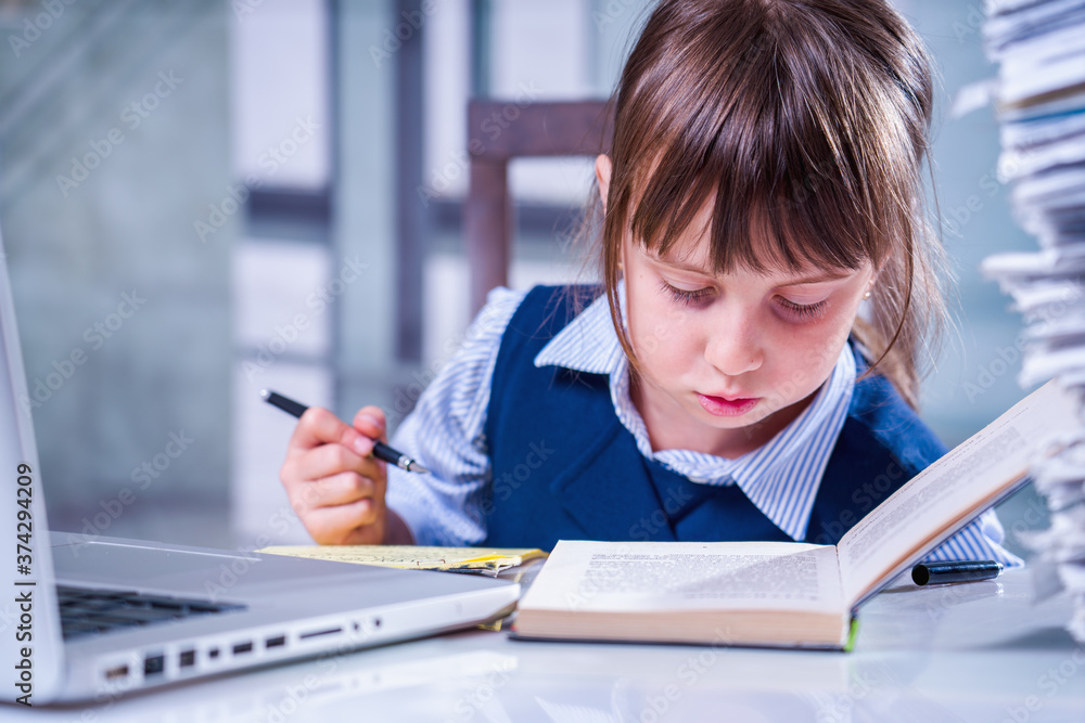 Business, training and internship concept. Young beautiful girl worker is training at a new job. She is working with lot of documents. Business, training and internship concept. Young beautiful girl worker is training at a new job. She is working with lot of documents.