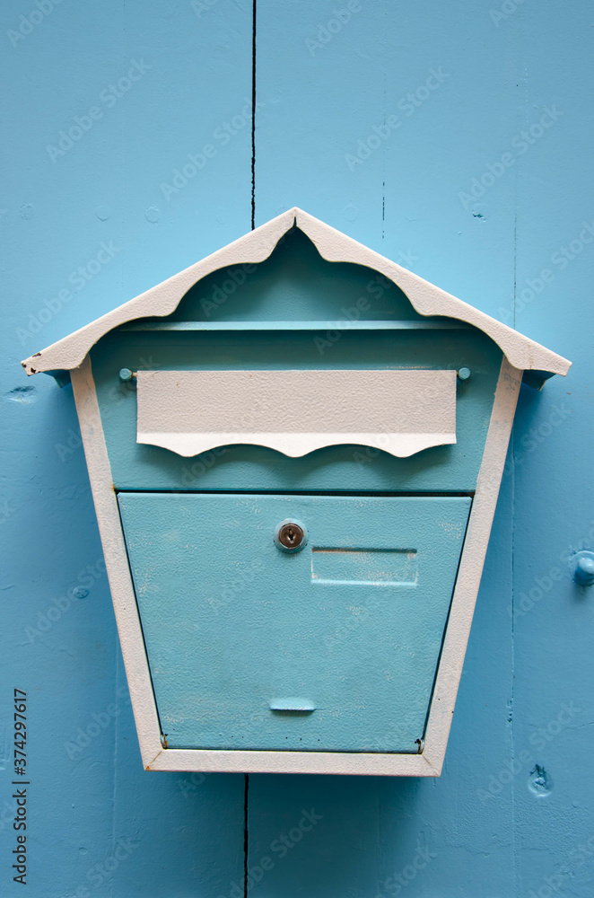 Blue mailbox. Letter box retro background.