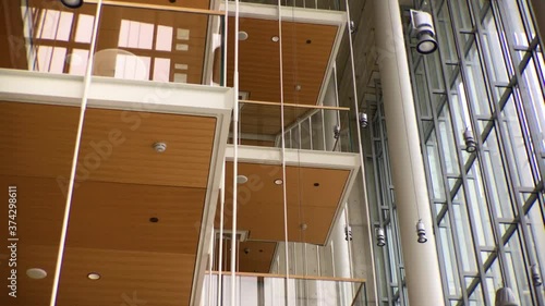 Glass balconies and chandeliers photo