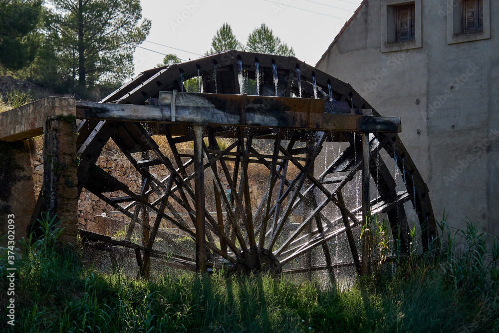 Old wooden waterwheel, still in use, in Casas del Rio, Spain Old wooden waterwheel, still in use, in Casas del Rio, Spain