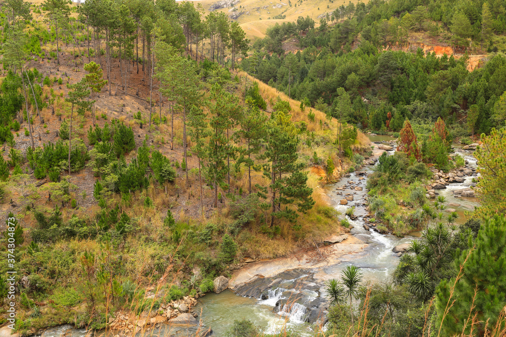 Stormy river running among the mountains in Madagascar Stormy river running among the mountains in Madagascar