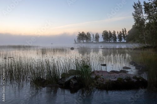 sunrise at a misty lake, Suomenniemi Finland © EsaHiltula