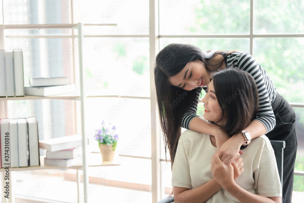 LGBT, Asian women lesbian couple working together as teamwork in business office LGBT, Asian women lesbian couple working together as teamwork in business office