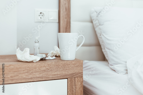 Medicines and pills bedside table illness symptoms