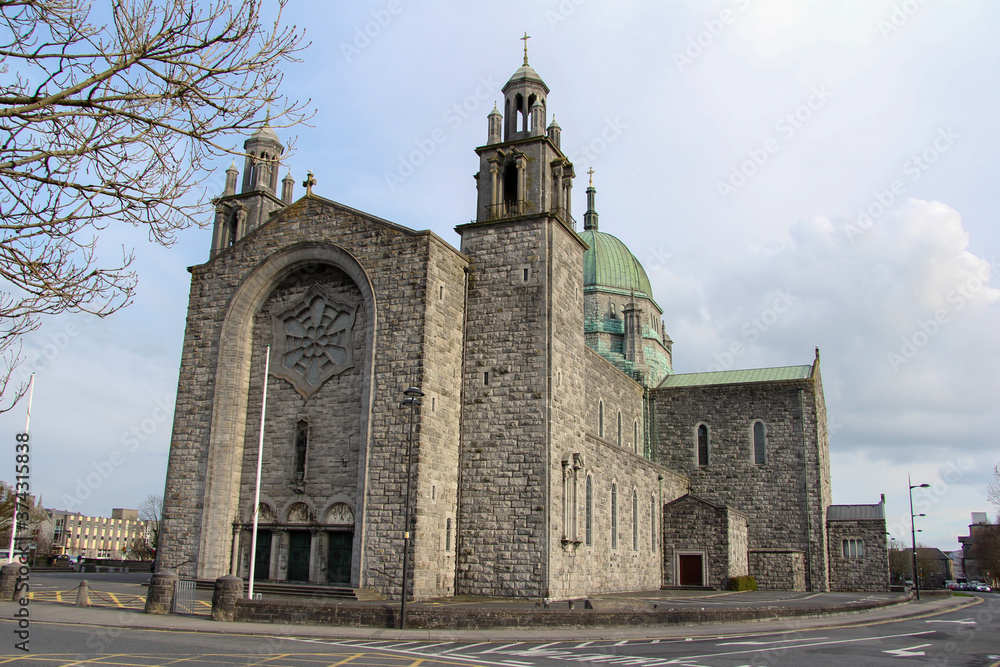 Stone cathedral with green dome in Galway