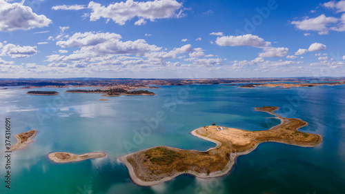 Aerial view of Alqueva Dam artificial Lake, near aldeia da luz, Alentejo tourist destination region, Portugal.