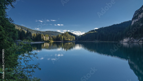 Fototapeta Naklejka Na Ścianę i Meble -  Lago di Braies, a charming, crystal clear alpine lake, located at the foot of Croda del Becco mountain, Alta Via 1 trek starting point, Prags Dolomites, Trentino-Alto Adige, South Tirol, Italy.