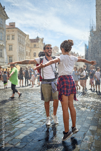 Photography Couple traveling together and enjoying at raining day.