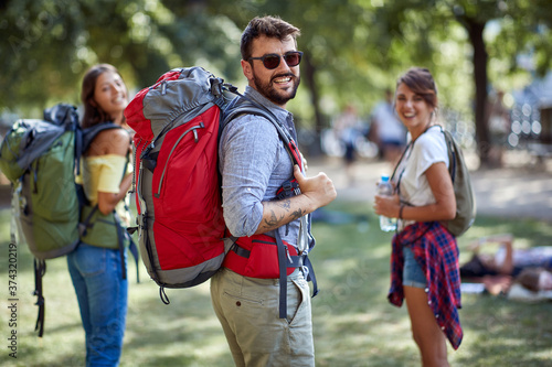 Photography Group of friends backpackers walking and traveling  and enjoying  together