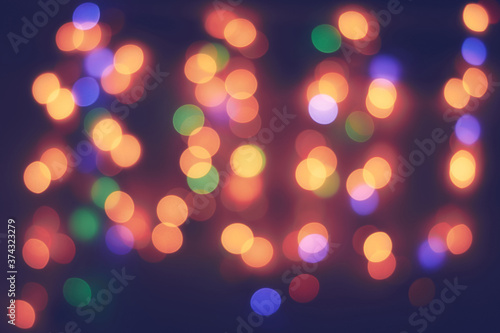 Defocused bokeh lights Yellow red green blue purple blurred lights bokeh vintage background