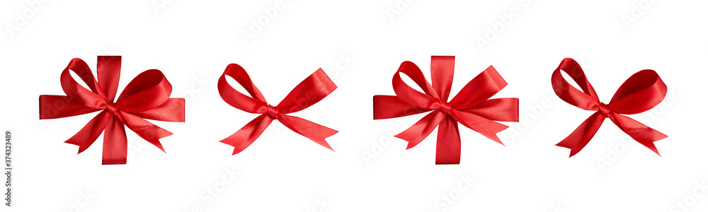 A collection of red ribbon bows for Christmas, birthday and valantines presents isolated against a white background