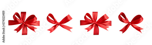 Obraz na płótnie A collection of red ribbon bows for Christmas, birthday and valantines presents isolated against a white background w salonie