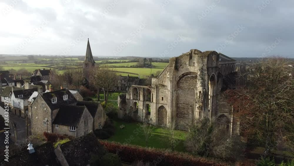Aerial view, down move. Surroundings of an old abbey in Malmsbury, England Aerial view, down move. Surroundings of an old abbey in Malmsbury, England