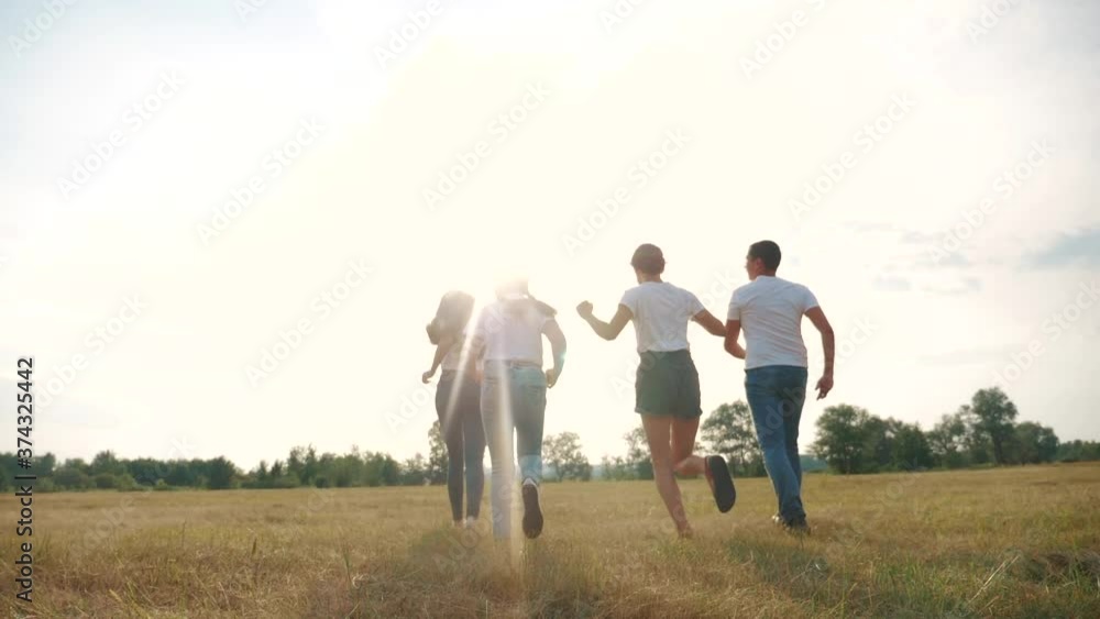 happy family children kids together run in park at sunset silhouette. people in park concept mom a dad daughter and son lifestyle joyful run. parents and little baby child fun summer vacation running happy family children kids together run in park at sunset silhouette. people in park concept mom a dad daughter and son lifestyle joyful run. parents and little baby child fun summer vacation running