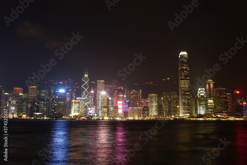City landscape. Victoria Harbor and Hong Kong skyscrapers at night. © Hirotsugu