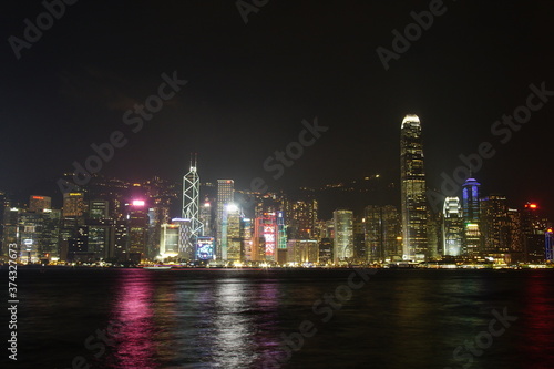City landscape. Victoria Harbor and Hong Kong skyscrapers at night. © Hirotsugu