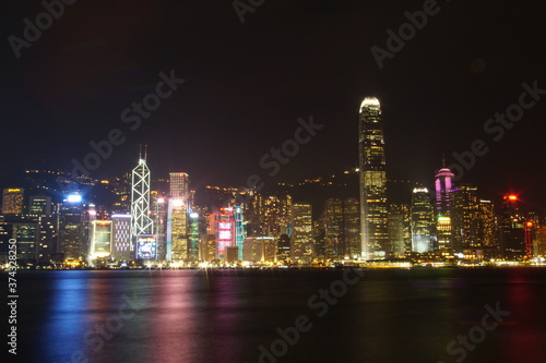 City landscape. Victoria Harbor and Hong Kong skyscrapers at night. © Hirotsugu