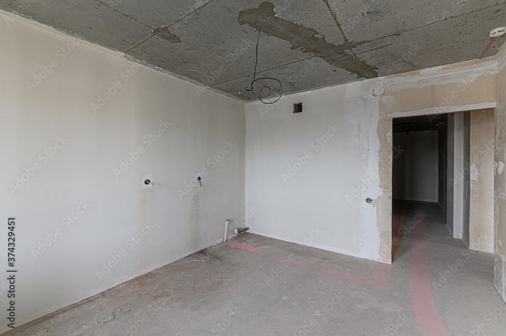 Russia, Moscow- February 15, 2020: interior room rough repair for self-finishing. interior decoration, bare walls of the premises, stage of construction Russia, Moscow- February 15, 2020: interior room rough repair for self-finishing. interior decoration, bare walls of the premises, stage of construction