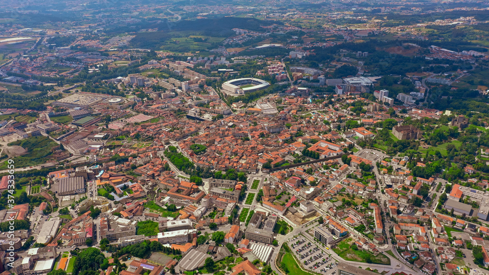Guimarães city in the most of the image, you can see the castle, the stadium, the center. Portugal.