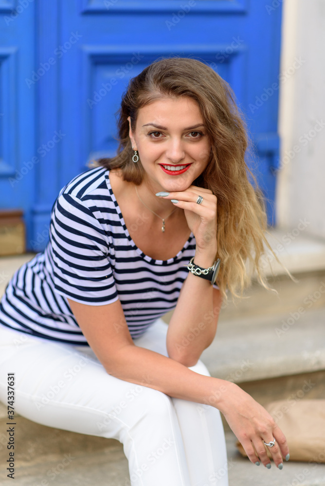 Close-up portrait of a young beautiful woman. Close-up portrait of a young beautiful woman.