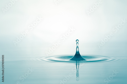 Water droplets on surface water background