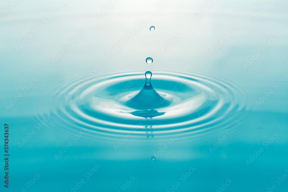 Water droplets on surface water background