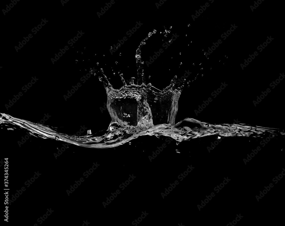 close up of water splash and bubbles isolated on black background
