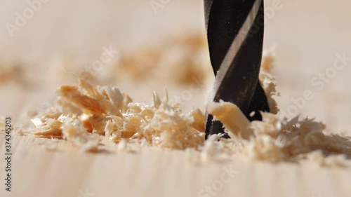 Wallpaper Mural Slow motion shoot of wood drilling
 Torontodigital.ca