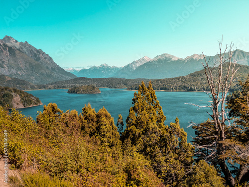 Fototapeta Naklejka Na Ścianę i Meble -  View from the mountain of the Moreno's lake with forest and high mountains in the background. Bariloche, Patagonia, Argentina.