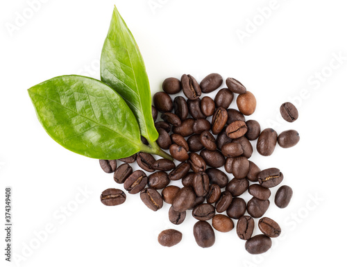 coffee beans with green leaves isolated on a white background, top view