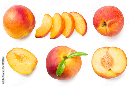 peach fruits with green leaf and slices isolated on white background. top view