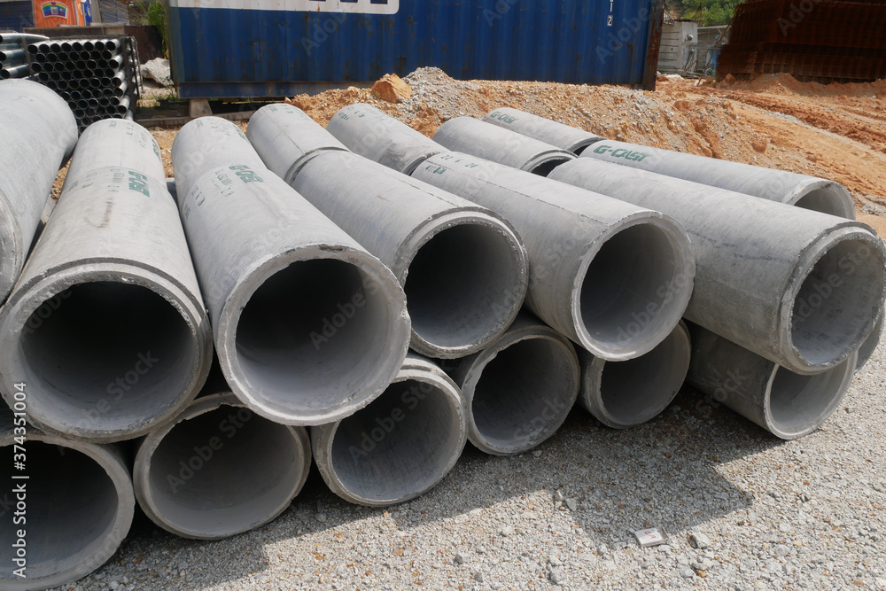 KUALA LUMPUR, MALAYSIA -MAY 13, 2020: Concrete culvert at construction site. The material is shipped by the manufacturer and is ready for installation. Made of reinforced concrete
KUALA LUMPUR, MALAYSIA -MAY 13, 2020: Concrete culvert at construction site. The material is shipped by the manufacturer and is ready for installation. Made of reinforced concrete