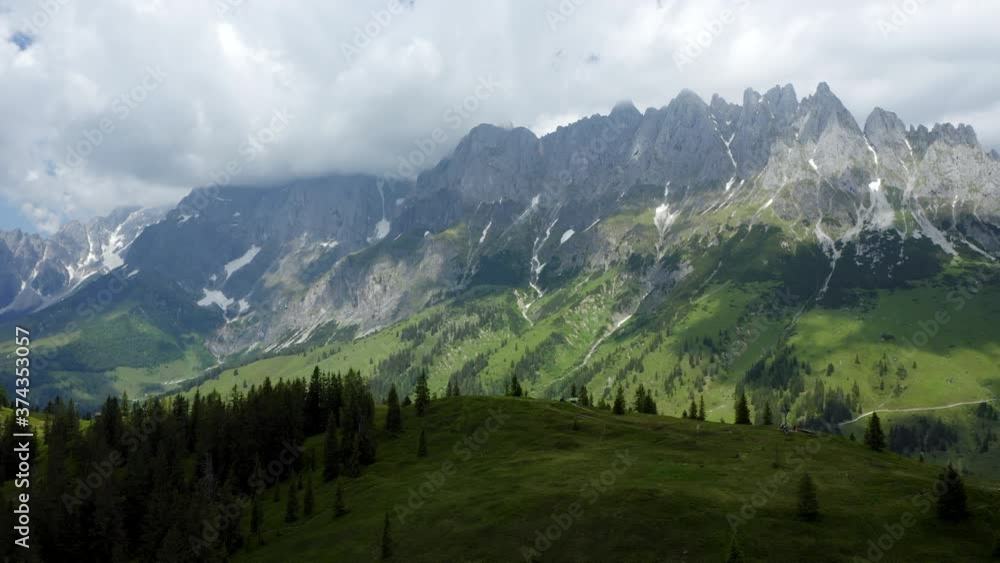 Aerial view of Kaiser mountains and alpine forest, Tirol Austria Aerial view of Kaiser mountains and alpine forest, Tirol Austria
